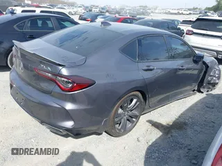 2022 Acura TLX w/A-Spec Package z VIN 19UUB5F53NA002629, wystawiony jako IAAI lot #41836622 z przebiegiem 51 815 mil mil oraz . Historia ofert i sprzedaży dostępna na DreamBid. Obrazek 4.