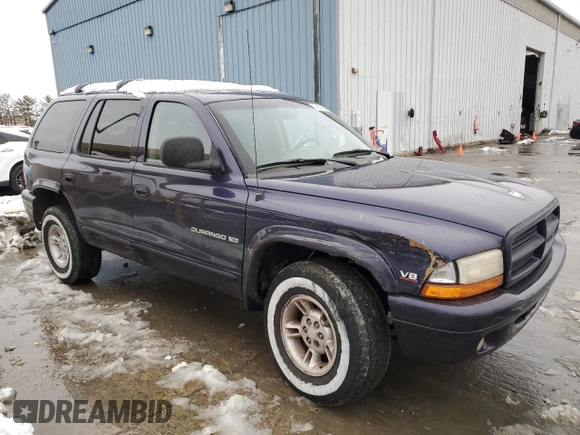 1999 Dodge Durango with VIN 1B4HS28Y3XF569044, listed as a Copart auction lot 44583815 with 70,682 mi miles and Salvage title. Bid and sale history available at DreamBid. Image 4.