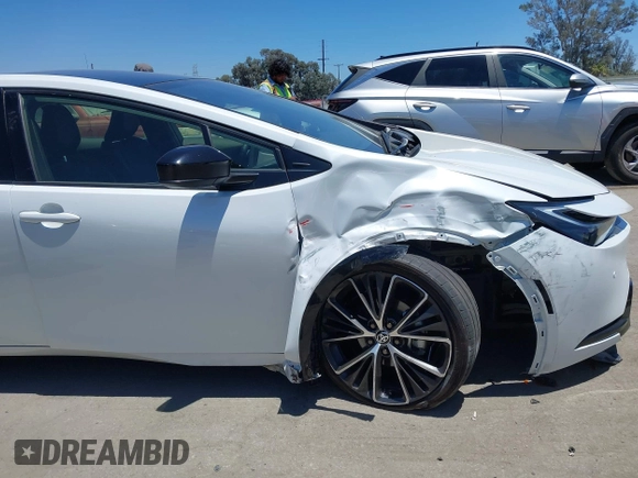 2024 Toyota Prius LE with VIN JTDACAAU2R3020703, listed as a IAAI auction lot 42644240 with 32,715 mi miles and . Bid and sale history available at DreamBid. Image 6.