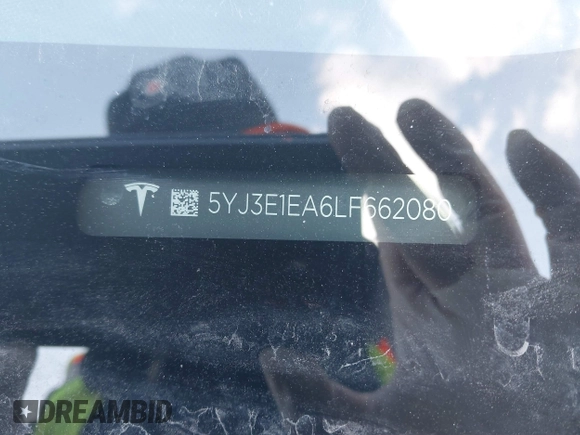 2020 Tesla Model 3 Standard Range Plus z VIN 5YJ3E1EA6LF662080, wystawiony jako IAAI lot #41410445 z przebiegiem Nie podano mil oraz . Historia ofert i sprzedaży dostępna na DreamBid. Obrazek 9.