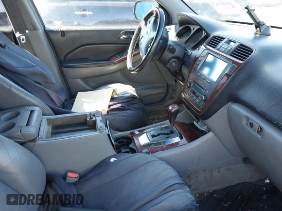 2004 Acura MDX Touring Pkg with VIN 2HNYD186X4H515704, listed as a IAAI auction lot 41851825 with 999,999 mi miles. Bid and sale history available at carsss.com. Image 5.