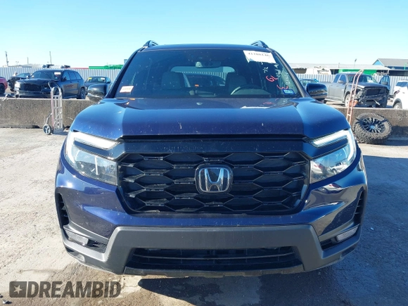 2023 Honda Passport Elite with VIN 5FNYF8H06PB012234, listed as a IAAI auction lot 41208146 with 38,491 mi miles and . Bid and sale history available at DreamBid. Image 12.