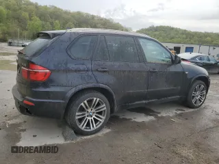 2012 BMW X5 35i z VIN 5UXZV4C5XCL748652, wystawiony jako Copart lot #55457455 z przebiegiem 149 030 mil mil oraz Szkoda całkowita • Salvage title. Historia ofert i sprzedaży dostępna na DreamBid. Obrazek 3.