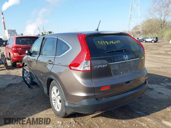 2014 Honda CR-V EX z VIN 2HKRM4H50EH668801, wystawiony jako IAAI lot #41909629 z przebiegiem 128 629 mil mil oraz . Historia ofert i sprzedaży dostępna na DreamBid. Obrazek 3.