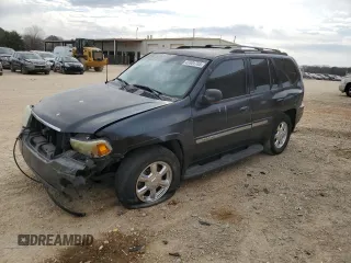 2003 GMC Envoy SLT with VIN 1GKDS13S832143645, listed as a Copart auction lot 47401765 with 0 mi miles and Salvage Title. Bid and sale history available at carsss.com. Image 1.