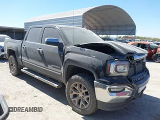 2017 GMC Sierra 1500 SLT z VIN 3GTU2NEC2HG266624, wystawiony jako IAAI lot #41847237 z przebiegiem 99 834 mil mil oraz . Historia ofert i sprzedaży dostępna na DreamBid. Obrazek 1.