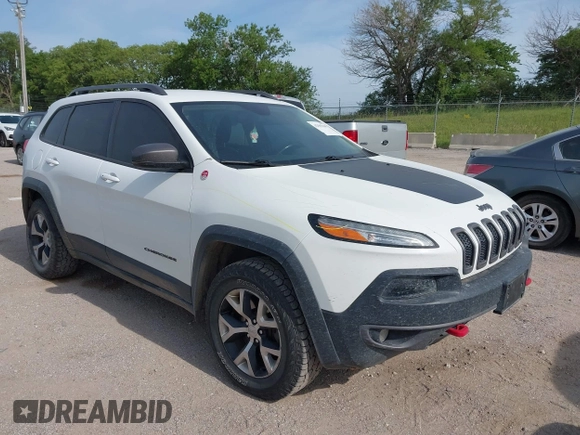 2015 Jeep Cherokee Trailhawk with VIN 1C4PJMBS6FW687718, listed as a IAAI auction lot 42505169 with 122,526 mi miles and . Bid and sale history available at DreamBid. Image 1.