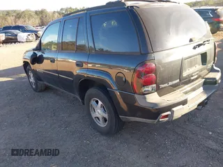 2003 Chevrolet TrailBlazer LS with VIN 1GNDS13SX32251607, listed as a IAAI auction lot 41613042 with 129,380 mi miles. Bid and sale history available at carsss.com. Image 3.