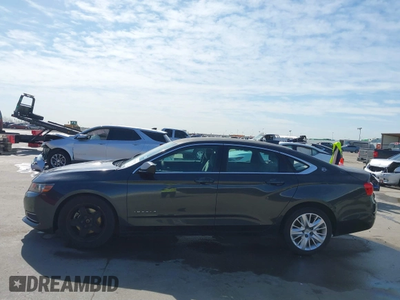 2015 Chevrolet Impala LS with VIN 1G11Z5SL0FU103024, listed as a IAAI auction lot 41793624 with 200,119 mi miles and . Bid and sale history available at DreamBid. Image 14.