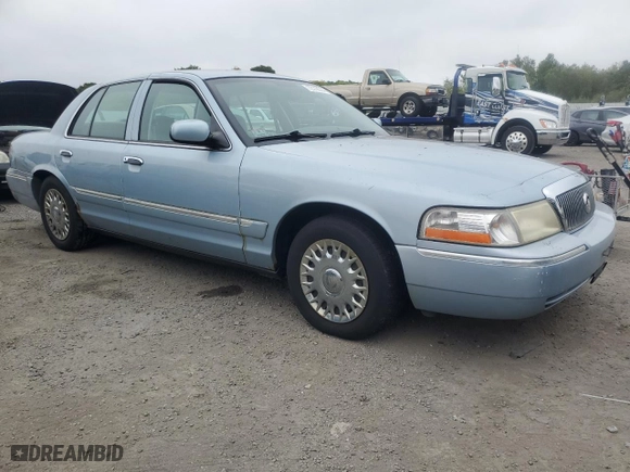 2003 Mercury Grand Marquis GS Convenience with VIN 2MEFM74W63X704603, listed as a Copart auction lot 72118014 with 128,599 mi miles and Clean Title. Bid and sale history available at carsss.com. Image 4.