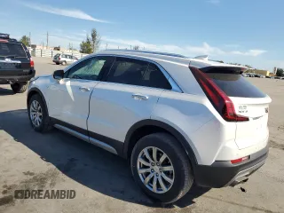 2022 Cadillac XT4 FWD Premium Luxury with VIN 1GYFZCR45NF100049, listed as a Copart auction lot 50213255 with 62,391 mi miles and Salvage title. Bid and sale history available at DreamBid. Image 2.