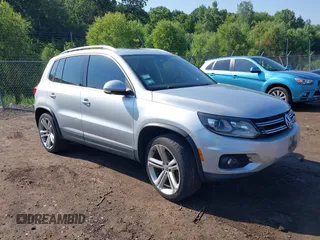 2012 Volkswagen Tiguan SE with VIN WVGBV7AX3CW604086, listed as a IAAI auction lot 42602117 with 134,215 mi miles and . Bid and sale history available at DreamBid. Image 1.
