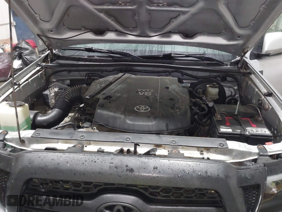 2011 Toyota Tacoma with VIN 3TMLU4EN9BM070836, listed as a IAAI auction lot 41668595 with 89,879 mi miles and . Bid and sale history available at DreamBid. Image 10.