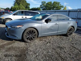 2021 Mazda 6 Grand Touring Reserve with VIN JM1GL1WY3M1602898, listed as a Copart auction lot 67871314 with 104,679 mi miles and Salvage Title. Bid and sale history available at DreamBid. Image 1.