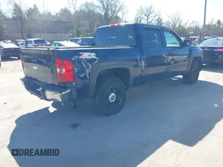 2007 Chevrolet Silverado 1500 LTZ with VIN 2GCEK13M571693165, listed as a IAAI auction lot 42077886 with 244,826 mi miles. Bid and sale history available at carsss.com. Image 4.