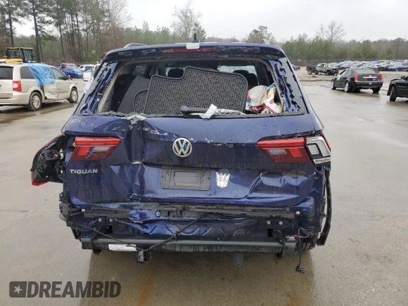 2021 Volkswagen Tiguan S with VIN 3VV1B7AX7MM065841, listed as a Copart auction lot 43815795 with 64,454 mi miles and Salvage title. Bid and sale history available at DreamBid. Image 6.