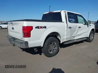 2020 Ford F-150 XL with VIN 1FTEW1E4XLKE95564, listed as a IAAI auction lot 41771629 with 125,333 mi miles and . Bid and sale history available at DreamBid. Image 4.