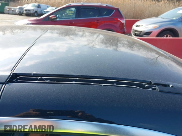 2013 BMW 3 Series 335i with VIN WBADX7C52DJ590132, listed as a IAAI auction lot 41486602 with 154,984 mi miles and . Bid and sale history available at DreamBid. Image 19.