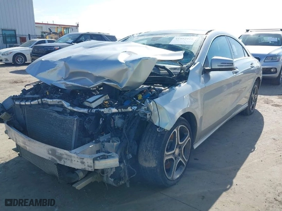 2014 Mercedes-Benz CLA-Class CLA 250 with VIN WDDSJ4GB8EN098151, listed as a IAAI auction lot 41592910 with 76,765 mi miles. Bid and sale history available at carsss.com. Image 2.