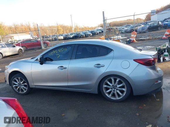 2014 Mazda 3 S Grand Touring with VIN JM1BM1W38E1184450, listed as a IAAI auction lot 40954511 with 157,036 mi miles and . Bid and sale history available at DreamBid. Image 13.