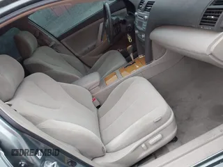 2007 Toyota Camry CE z VIN 4T1BE46K37U716769, wystawiony jako IAAI lot #42233779 z przebiegiem 166 265 mil mil oraz . Historia ofert i sprzedaży dostępna na DreamBid. Obrazek 5.