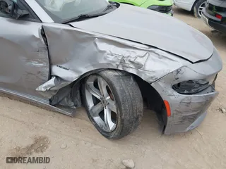 2018 Dodge Charger R/T with VIN 2C3CDXCTXJH148030, listed as a IAAI auction lot 41225873 with 105,069 mi miles. Bid and sale history available at carsss.com. Image 6.