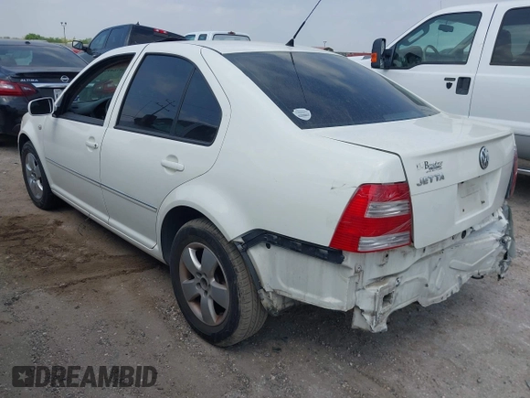 2004 Volkswagen Jetta Sedan GLS with VIN 3VWSK69M94M050424, listed as a IAAI auction lot 42076499 with 163,597 mi miles. Bid and sale history available at carsss.com. Image 3.