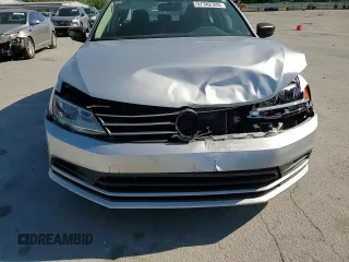 2015 Volkswagen Jetta S z VIN 3VW2K7AJ1FM297799, wystawiony jako Copart lot #57382305 z przebiegiem 107 279 mil mil oraz Czysty tytuł • Clean title. Historia ofert i sprzedaży dostępna na DreamBid. Obrazek 13.