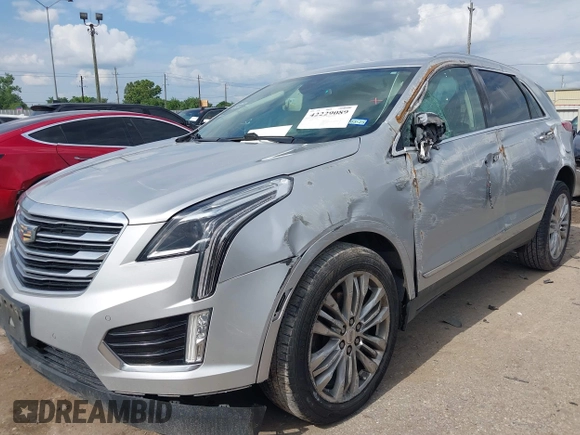 2019 Cadillac XT5 Premium Luxury AWD z VIN 1GYKNFRS0KZ207739, wystawiony jako IAAI lot #42229089 z przebiegiem 99 801 mil mil oraz . Historia ofert i sprzedaży dostępna na DreamBid. Obrazek 16.