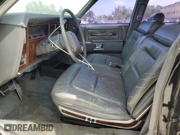 1985 Oldsmobile 88 z VIN 1G3BV69Y1FY384631, wystawiony jako Copart lot #43389795 z przebiegiem 180 641 mil mil oraz Szkoda całkowita • Salvage title. Historia ofert i sprzedaży dostępna na DreamBid. Obrazek 7.