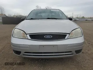 2007 Ford Focus S z VIN 1FAFP34N97W236303, wystawiony jako Copart lot #55248765 z przebiegiem 125 900 mil mil oraz Szkoda całkowita • Salvage title. Historia ofert i sprzedaży dostępna na DreamBid. Obrazek 5.