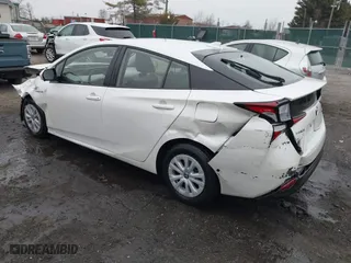 2019 Toyota Prius L Eco with VIN JTDKARFU8K3081187, listed as a IAAI auction lot 41771346 with 64,864 mi miles. Bid and sale history available at carsss.com. Image 3.