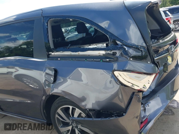 2022 Honda Odyssey Touring with VIN 5FNRL6H89NB008814, listed as a IAAI auction lot 42597738 with 49,933 mi miles and . Bid and sale history available at DreamBid. Image 18.
