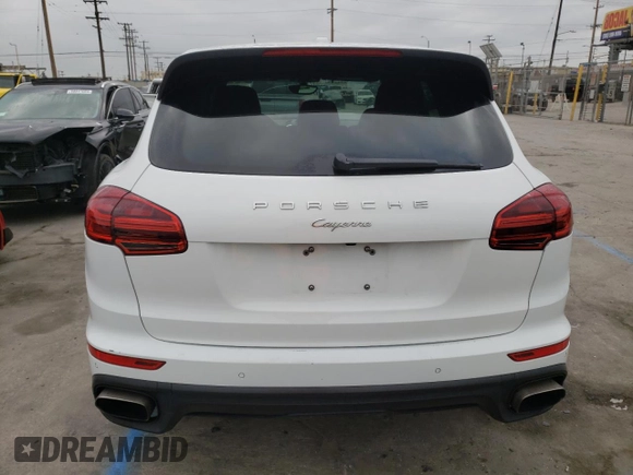 2017 Porsche Cayenne with VIN WP1AA2A24HKA81225, listed as a Copart auction lot 68863544 with 80,828 mi miles and Salvage title. Bid and sale history available at DreamBid. Image 6.