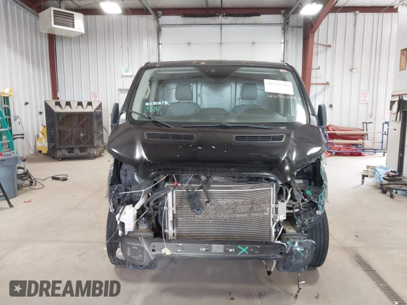 2018 Ford Transit with VIN 1FTYE1YM6JKA38498, listed as a IAAI auction lot 42522740 with 117,220 mi miles and . Bid and sale history available at DreamBid. Image 12.