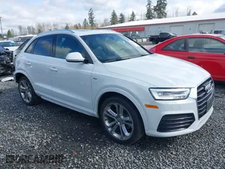 2018 Audi Q3 Premium Plus with VIN WA1JCCFS9JR009373, listed as a IAAI auction lot 41816704 with 95,244 mi miles. Bid and sale history available at carsss.com. Image 1.