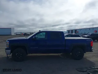2014 Chevrolet Silverado 1500 LT with VIN 3GCUKREC1EG328016, listed as a IAAI auction lot 41880166 with 164,486 mi miles. Bid and sale history available at carsss.com. Image 14.
