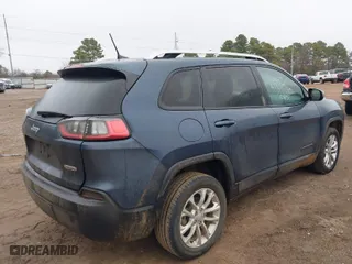 2020 Jeep Cherokee Latitude with VIN 1C4PJLCB3LD528042, listed as a IAAI auction lot 41301453 with 129,188 mi miles. Bid and sale history available at carsss.com. Image 4.