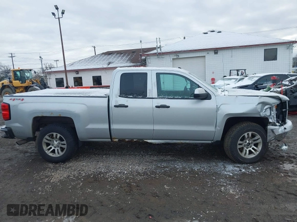 2014 Chevrolet Silverado 1500 LT with VIN 1GCVKREC5EZ115459, listed as a IAAI auction lot 41143910 with 275,008 mi miles and . Bid and sale history available at DreamBid. Image 12.