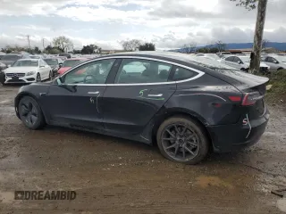 2019 Tesla Model 3 Long Range with VIN 5YJ3E1EB8KF384533, listed as a Copart auction lot 48557255 with 73,768 mi miles and Salvage Title. Bid and sale history available at carsss.com. Image 2.