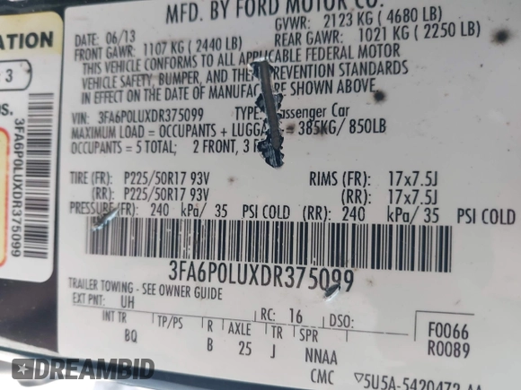 2013 Ford Fusion SE Hybrid with VIN 3FA6P0LUXDR375099, listed as a IAAI auction lot 41914387 with 133,178 mi miles. Bid and sale history available at carsss.com. Image 9.