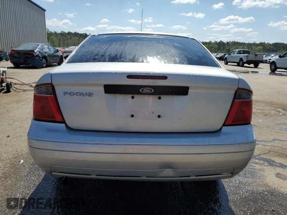 2007 Ford Focus S z VIN 1FAFP34N97W264411, wystawiony jako Copart lot #53251655 z przebiegiem 159 516 mil mil oraz Szkoda całkowita • Salvage title. Historia ofert i sprzedaży dostępna na DreamBid. Obrazek 6.