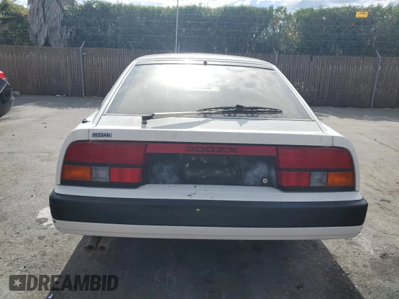 1985 Nissan 300ZX z VIN JN1HZ16S9FX050874, wystawiony jako Copart lot #72283704 z przebiegiem 139 895 mil mil oraz Tytuł czysty. Historia ofert i sprzedaży dostępna na DreamBid. Obrazek 6.