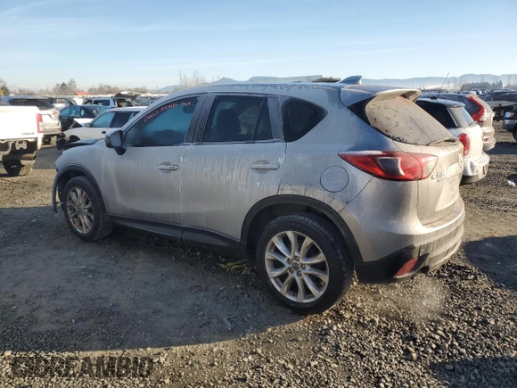 2013 Mazda CX-5 Grand Touring with VIN JM3KE4DEXD0155143, listed as a Copart auction lot 86852874 with 187,914 mi miles and Salvage Title. Bid and sale history available at carsss.com. Image 2.