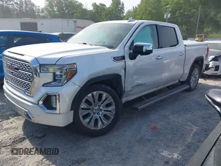 2020 GMC Sierra 1500 Denali z VIN 1GTU9FEL8LZ203683, wystawiony jako IAAI lot #42225894 z przebiegiem 42 577 mil mil oraz . Historia ofert i sprzedaży dostępna na DreamBid. Obrazek 17.