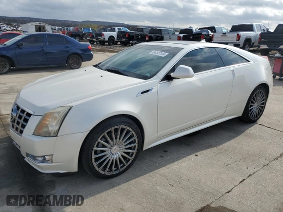 2014 Cadillac CTS Performance with VIN 1G6DG1E35E0190085, listed as a Copart auction lot 84347104 with 142,720 mi miles and Salvage title. Bid and sale history available at DreamBid. Image 1.