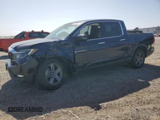 2021 Honda Ridgeline RTL-E with VIN 5FPYK3F75MB001663, listed as a Copart auction lot 61952705 with 52,093 mi miles and Salvage title. Bid and sale history available at DreamBid. Image 1.