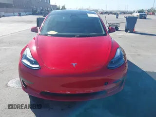 2023 Tesla Model 3 with VIN 5YJ3E1EA1PF385490, listed as a IAAI auction lot 42315884 with 17,590 mi miles and . Bid and sale history available at DreamBid. Image 13.