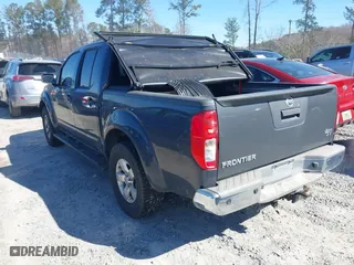 2013 Nissan Frontier SV with VIN 1N6AD0ERXDN744081, listed as a IAAI auction lot 41639057 with 141,102 mi miles. Bid and sale history available at carsss.com. Image 3.