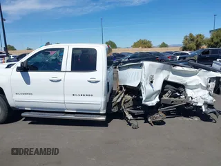 2018 Chevrolet Silverado 1500 LT with VIN 1GCRCREH5JZ168411, listed as a IAAI auction lot 41885403 with 37,449 mi miles and . Bid and sale history available at DreamBid. Image 14.